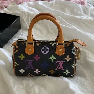 Authentic Louis Vuitton mini speedy black and monogram